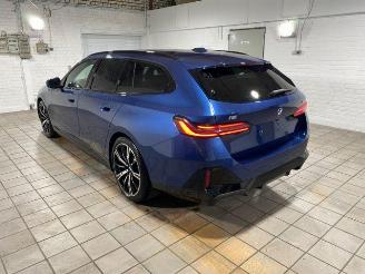 Schadeauto BMW i5 xDrive40 Touring M Sport Pro PANO/HUD/360/B&W 2025/10
