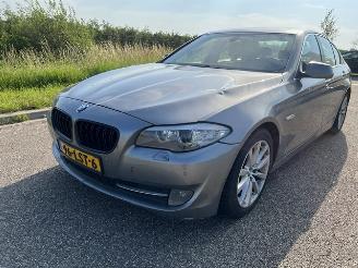 damaged passenger cars BMW 5-serie 523i Executive Schuifdak 2010/6