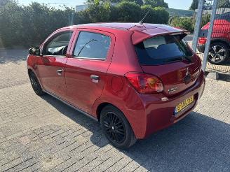 Damaged car Mitsubishi Space-star 1.0  5-drs airco NAP 2014/7