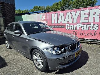 krockskadad bil auto BMW 1-serie 118I  business line 2009/9