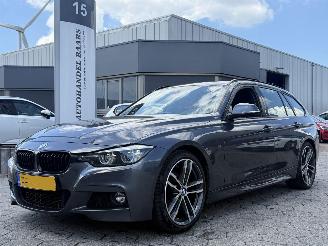 Schadeauto BMW 3-serie Touring 320i AUTOMAAT 2019/1