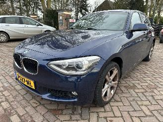 skadebil auto BMW 1-serie 114d High Executive 2013/5