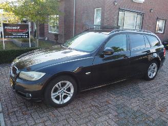 Schadeauto BMW 3-serie 318i Business Line 2009/7