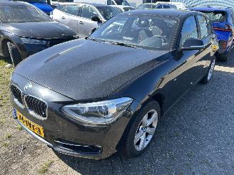 Vaurioauto  passenger cars BMW 1-serie 116i  Sport  Automaat  ( Motorschade ) 2012/4