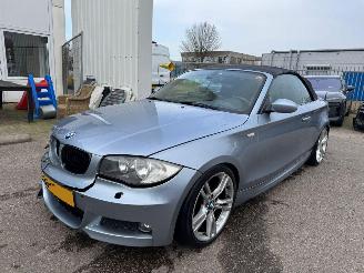 damaged passenger cars BMW 1-serie Cabrio 118i High Executive 2009/2