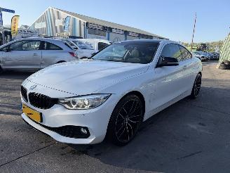Vaurioauto  passenger cars BMW 4-serie 420I 135KW Autom. Clima Navi Leer High Executive NAP 2014/2