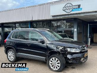 Damaged car Volkswagen Tiguan 1.4 TSI R-Line DSG Dynaudio Stoelverwarming Climate Cruise 2014/1