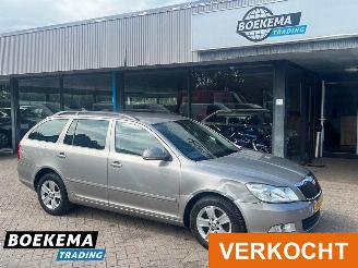 skadebil auto Skoda Octavia Combi 1.6 TDI Business Line Navi Clima Elektrische ramen 2011/6