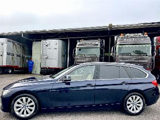 Voiture accidenté BMW 3-serie 320i 184pk 8-traps aut High Executive 2014/1