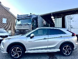 Vaurioauto  passenger cars Mitsubishi Eclipse Cross 2.4 PHEV Plug-In Hybr aut 4WD Exec - nap - 1e eig - xenon - 360cam - front + line + side assist - stuurverw 2023/3