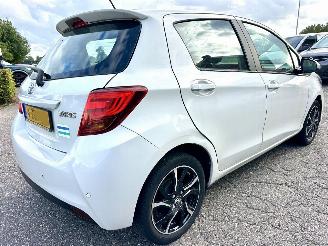 Toyota Yaris 1.3 VVT-i 99pk aut + f1 Dynamic - 48dkm nap - 1e eig - navi - cam - pdc v+a - airco - cruise - parelmoer picture 4