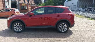 skadebil auto Mazda CX-5 2.2 175pk Automatik 4x4 Navigatie Xenon Climatecontrol CruiseControl Stoelverwarming Lichtautomaat Privacyglas Regensensor Achteruitrijcamera Keyless entry 2014/7