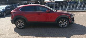 Unfallwagen Mazda CX-30 Bj 8-2019 1.8 Climatecontrol Leder Navi Led-Koplampen Led-Achterlichten Stoelverwarming Lichtautomaat Privacyglas keyless Entry Bose Soundsystem elektrische achterklep 2019/8