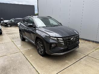 Damaged car Hyundai Tucson 1.6 T-GDI HEV Comfort-NAVI-CLIMA-CAMERA-PDC-CRUISE 2023/11