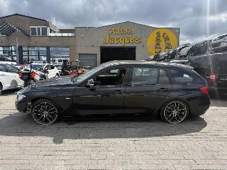 Damaged car BMW 3-serie TOURING 2013/4