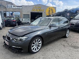 Damaged car BMW 3-serie LUXERY TOURING 2017/9