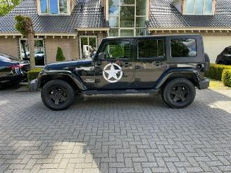 Vaurioauto  passenger cars Jeep Wrangler Unlimited 2.8 CRD SAHARA 2010/1